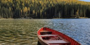 Boat on a mountain lake dock.